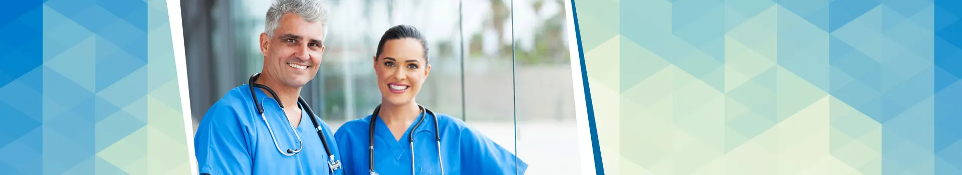 Two doctors standing in front of a window